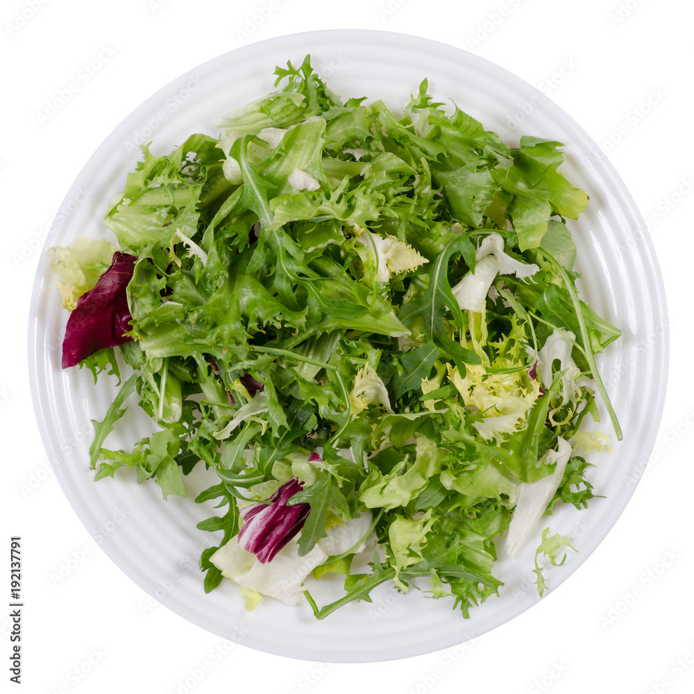 Mix of lettuce leaves in a white plate Mix of lettuce leaves in a white plate