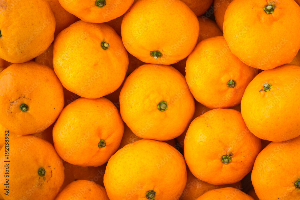 Clementine tangerines or Algerian mandarins texture pattern Clementine tangerines or Algerian mandarins texture pattern