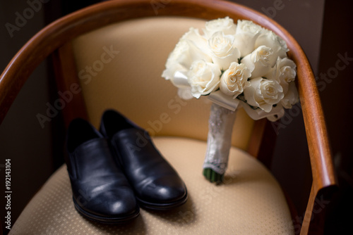 Wedding accessories. Bouquet and accessories of bride and groom. Wedding details photo