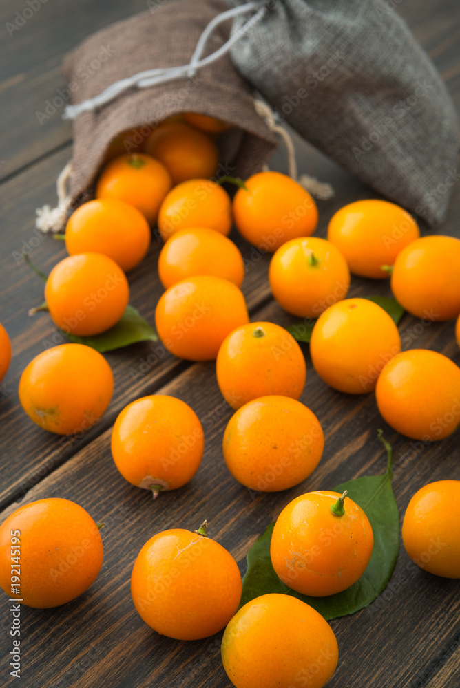 Cumquats, kinkans or fortunella orange fruits