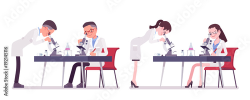 Male and female scientist with microscope