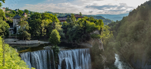 Beautiful enormous Jajce waterfall on the river Pliva photo