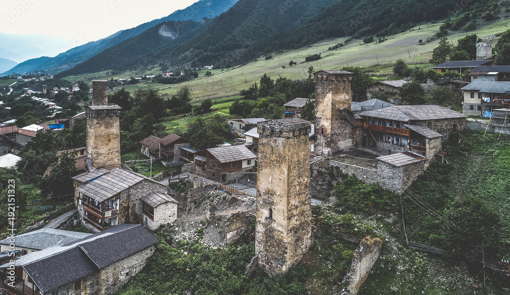 Aerial view of svan towers near the forest and old village Mestia, Georgia