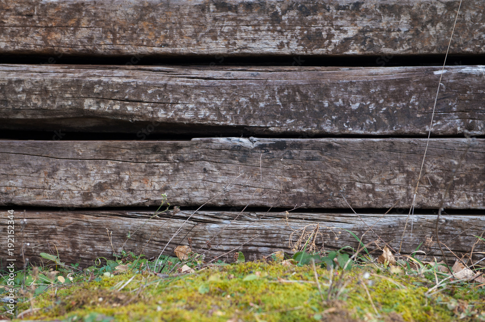 Fototapeta premium Set of old wooden railway sleepers as background, texture. Rough wooden background.