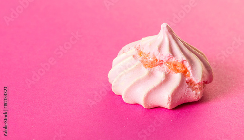 dessert meringue on pink close-up
