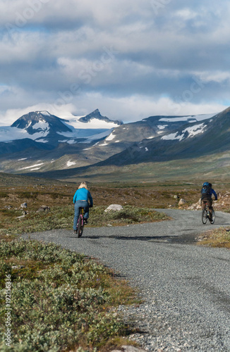 Cyclists on the road in the Jotunheimen National Park, Norway