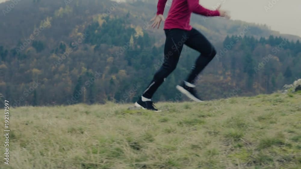Young man running in autumn nature. Young man running in autumn nature.