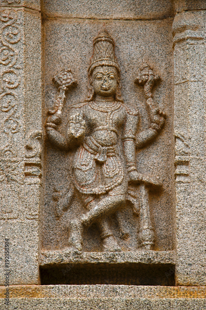 Carving details on the outer wall of Hazara Rama Temple. Hampi, Karnataka