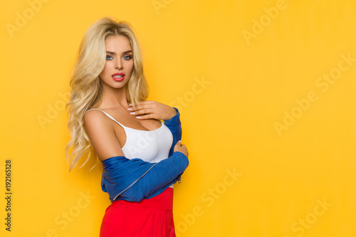 Sexy Blond Woman Is Looking At Camera