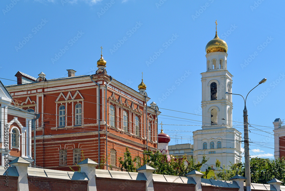 Obraz premium Travel showplace - Iversky Women's Monastery in Samara in sunny summer day, blue sky. Classic russian ortodox religion architecture