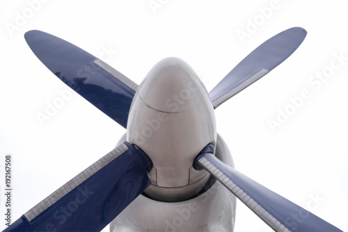 White-blue propeller screw aircraft isolated on white background. Bottom view.