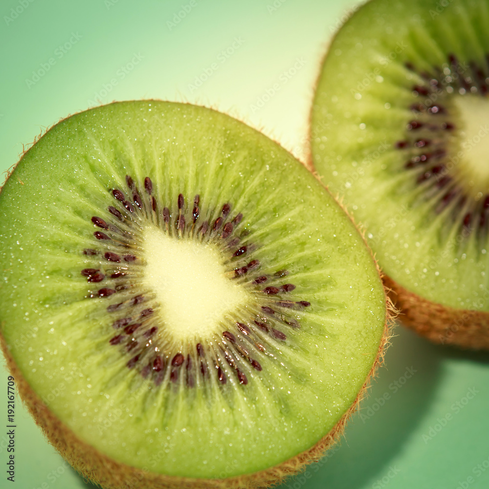 sliced kiwi fruit isolated on green background, pop art color technical sliced kiwi fruit isolated on green background, pop art color technical