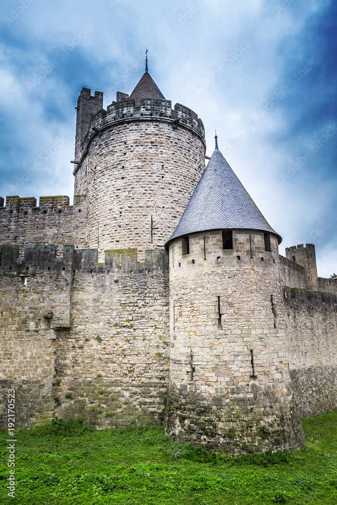 Ancient castle walls of Carcassonne fortress overlooking the southern France countryside