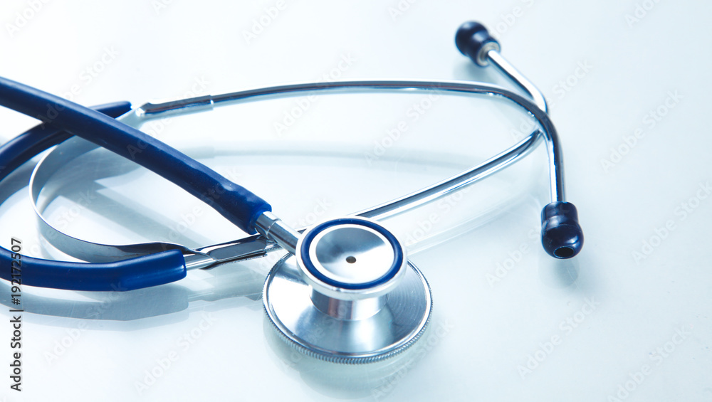 close up medical stethoscope on a white background close up medical stethoscope on a white background