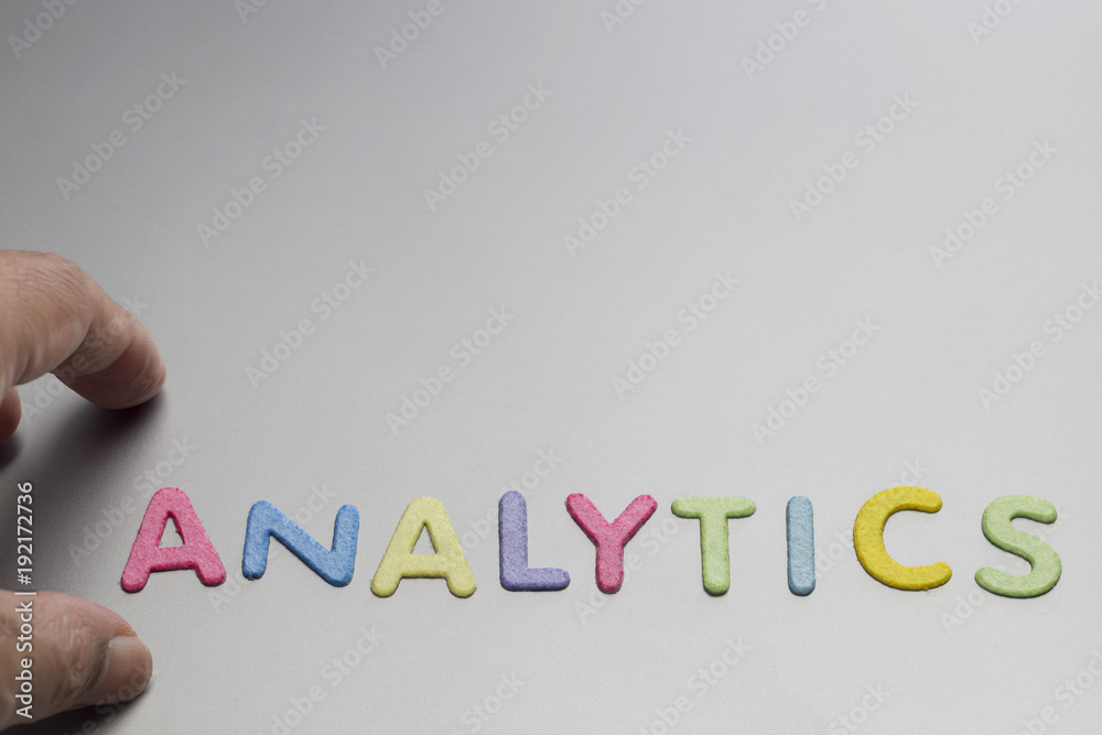 Analytics letters on black background