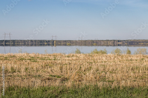 spring flood of the river in Siberia on a sunny May day