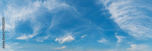Vibrant color panoramic sky with cloud on a sunny day. Beautiful cirrus cloud. Panorama photograph.