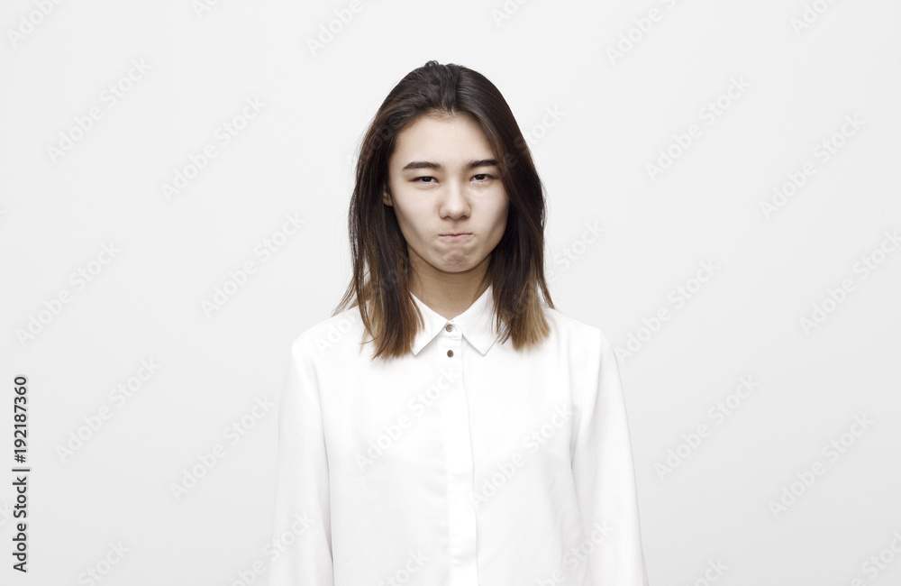 Closeup portrait displeased pissed off angry grumpy pessimistic woman with bad attitude. Negative human emotion facial expression feeling Closeup portrait displeased pissed off angry grumpy pessimistic woman with bad attitude. Negative human emotion facial expression feeling