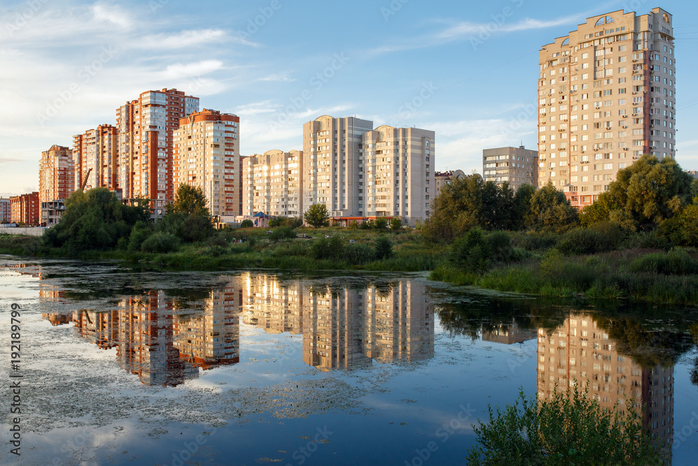 View of the new residential neighborhood on the banks of the river Pekhorka in summer. City of Balashikha, Moscow region, Russia. View of the new residential neighborhood on the banks of the river Pekhorka in summer. City of Balashikha, Moscow region, Russia.