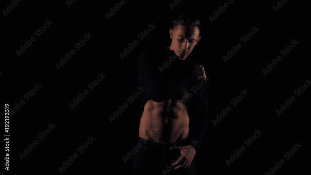 Man is posing in a flashing light Man is posing in a flashing light