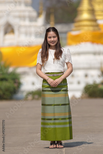 beautiful woman thai traditional culture, Asian woman wearing traditional Thai culture at countryside © kaiskynet