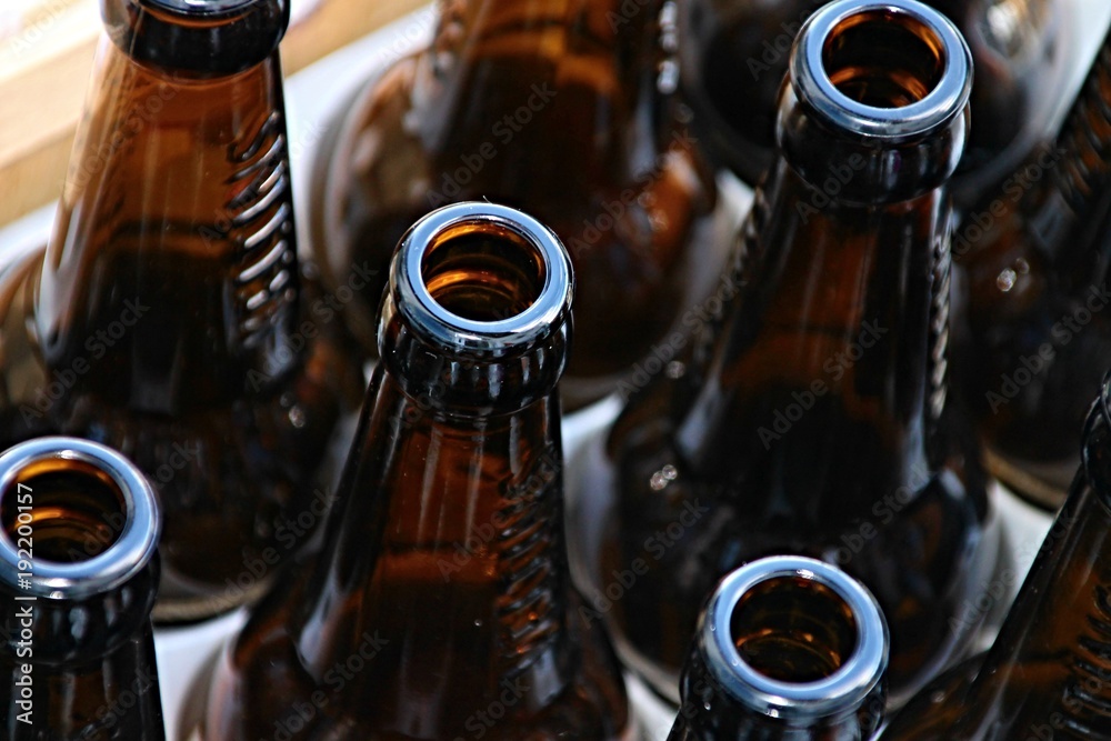 leere Bierflaschen in einem Bierkasten Stock Photo Adobe Stock