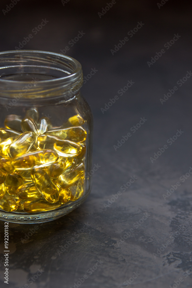 Yellow vitamin capsules, soft gelatin capsule with oily drug Yellow vitamin capsules, soft gelatin capsule with oily drug