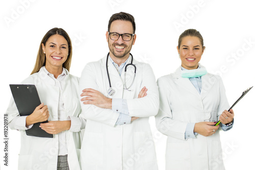 Portrait of three happy doc...