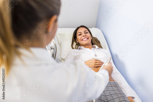 Young woman on ultrasound e...