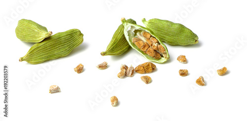 dried cardamom seeds isolated on white photo