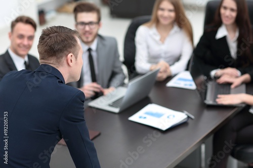 blurred image of business team at a Desk