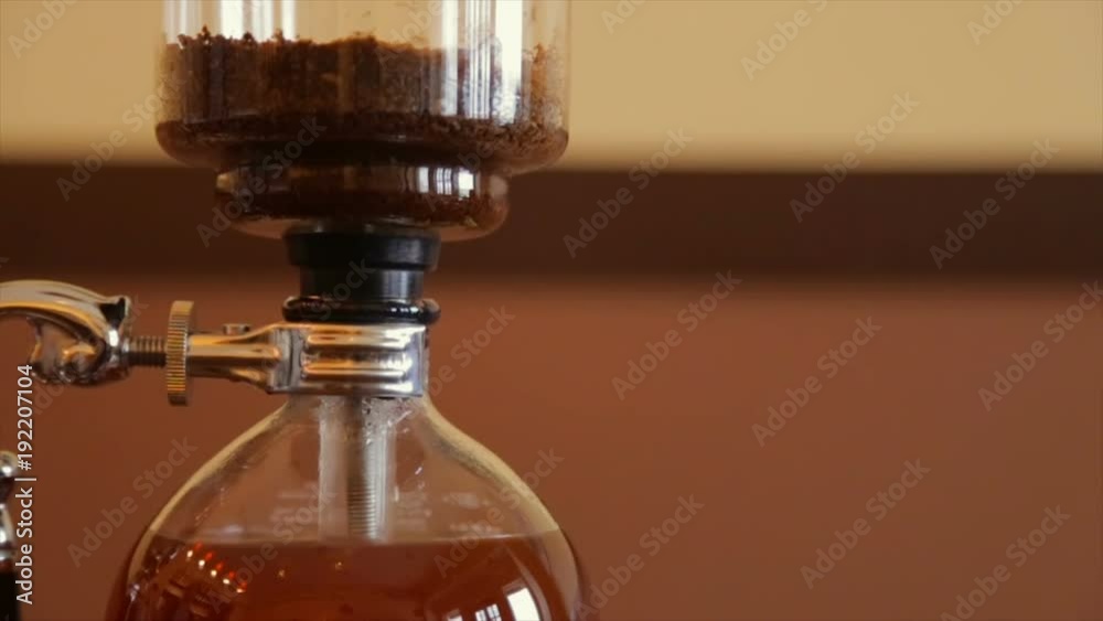 Alternative coffee-making methods. Brewed coffee in a glass flask Alternative coffee-making methods. Brewed coffee in a glass flask