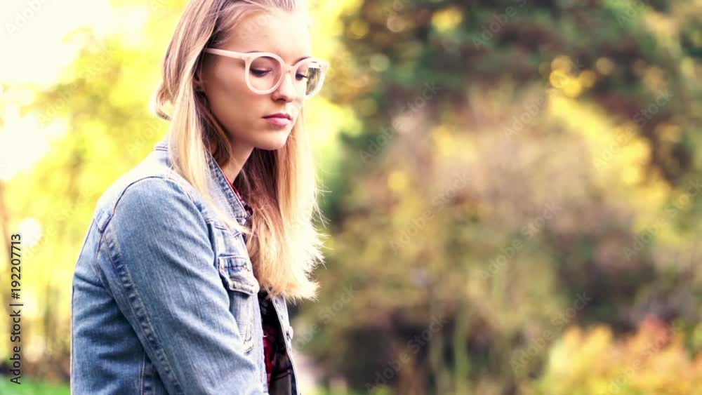 Sad unhappy woman sitting on the bench in beautiful garden
Sad unhappy woman sitting on the bench in beautiful garden