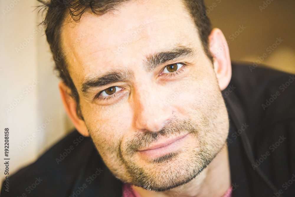 Obraz premium Young confident handsome man