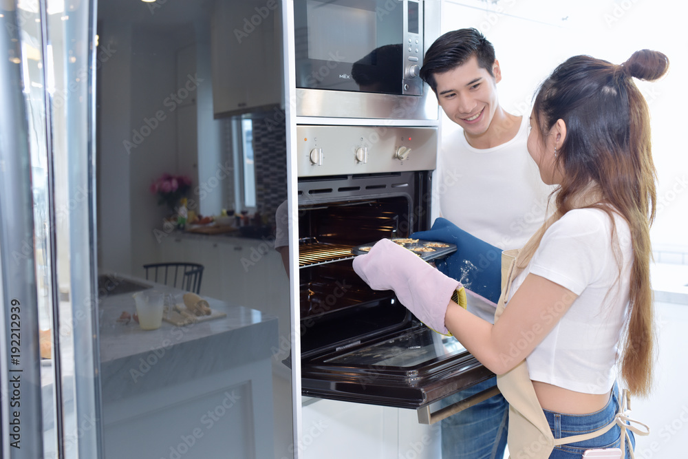 Asia young couple having fun on a kitchen . Couple Sweet home concept . Asia young couple having fun on a kitchen . Couple Sweet home concept .