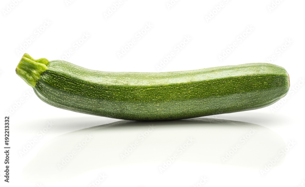 One green zucchini isolated on white background long raw courgette. One green zucchini isolated on white background long raw courgette.