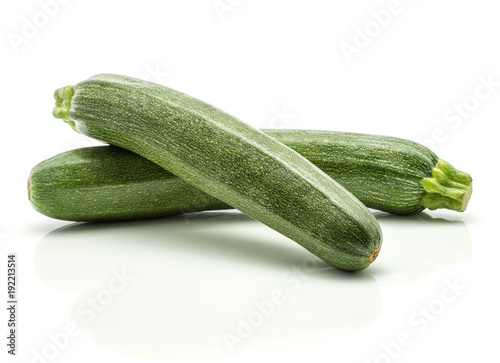 Green zucchini isolated on white background two raw courgette.