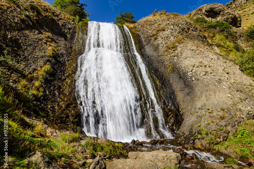 Artsci waterfall - a beautiful waterfall and natural landmark near Stepantsminda  Kazbegi  village  Caucasus mountains  Georgia