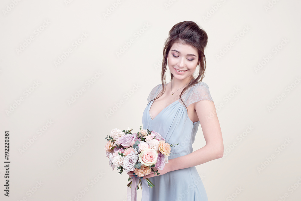 Beautiful female model with perfect fashion makeup and hairstyle. Elegant female hairstyle for the wedding. Beautiful female model with perfect fashion makeup and hairstyle. Elegant female hairstyle for the wedding.