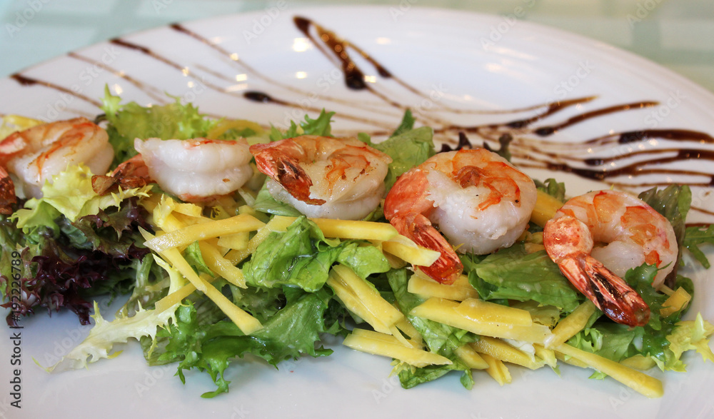 appetizing prawns with greens and cheese close-up appetizing prawns with greens and cheese close-up