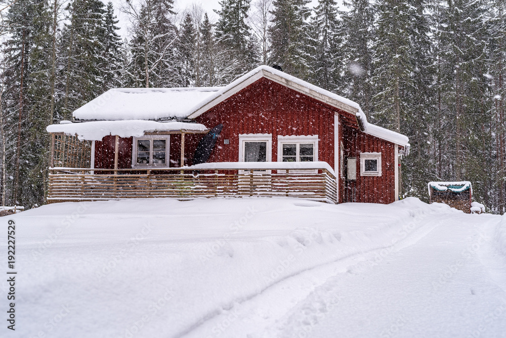 little red house in forest with snow little red house in forest with snow