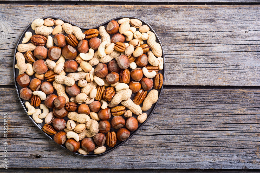 Mix of nuts in plate Mix of nuts in plate