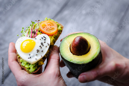 bruschetta with avocado microgrin, quail eggs and Adyghe cheese and mozzarella photo