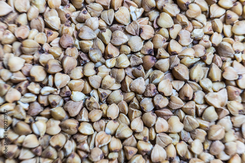 Buckwheat von. Raw buckwheat grains close-up. Macro background.