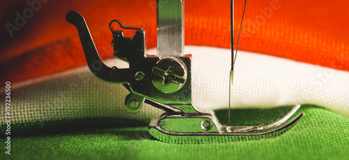 Detail of the leg of a sewing machine, with tricolor cloth of the Italian flag