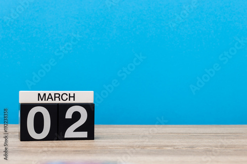 March 2nd. Day 2 of march month, calendar on light blue background. Spring time, empty space for text, mockup