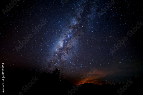 starry night sky with milky way. image contain soft focus, blur and noise due to long expose and high iso.
