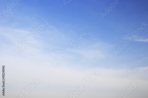 Soft white clouds against blue sky background and empty space © phatthanit