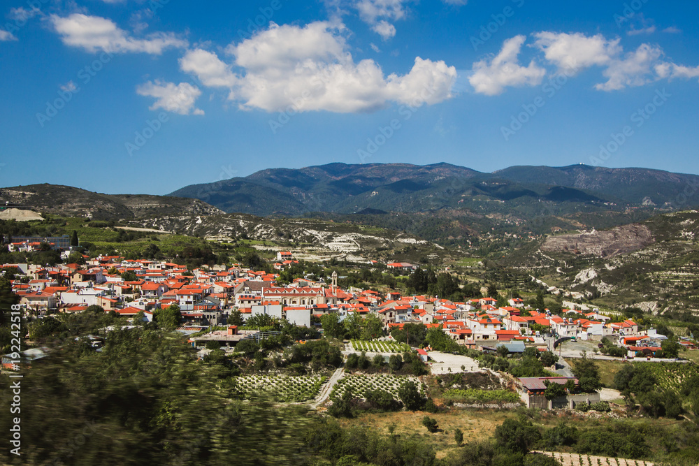 Orange roofs. Panoramic view near of Kato Lefkara - is the most famous village in the Troodos Mountains. Limassol district, Cyprus, Mediterranean Sea. Mountain landscape and sunny day. Orange roofs. Panoramic view near of Kato Lefkara - is the most famous village in the Troodos Mountains. Limassol district, Cyprus, Mediterranean Sea. Mountain landscape and sunny day.