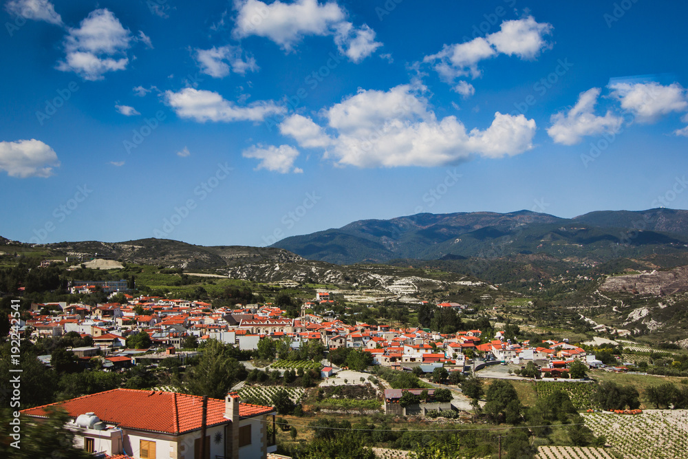 Orange roofs. Panoramic view near of Kato Lefkara - is the most famous village in the Troodos Mountains. Limassol district, Cyprus, Mediterranean Sea. Mountain landscape and sunny day.